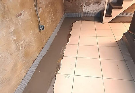 Finished basement French drain system
