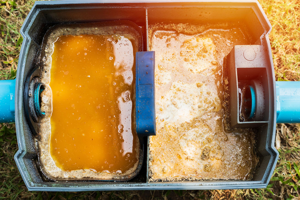 Cross-section of a sewer pipe showing fats, oils, and grease (FOG) buildup, highlighting the importance of FOG control in wastewater management.