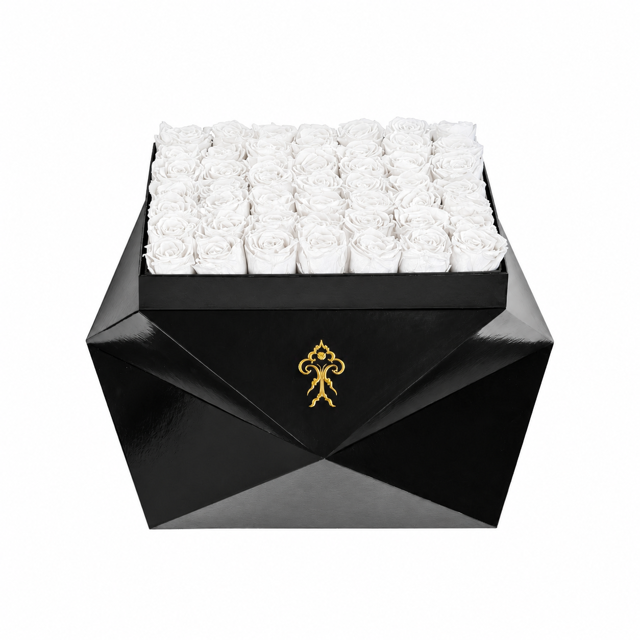 White roses arranged in a modern black flower box in Chicago
