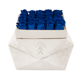 Blue roses arranged in white gift box for baby boy gifts and celebrations