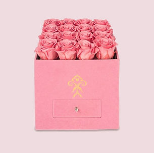 Sixteen pink preserved roses in a pink suede gift box with drawer