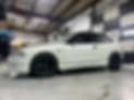 white car in shop