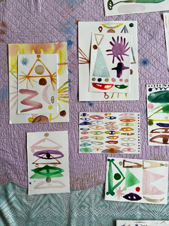Sketches on paper in coloured inks of abstract shapes