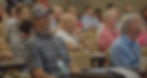 Member smiling in a meeting