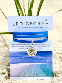 3 wrap leather bracelet with a Sand Dollar charm and a magnetic clasp.