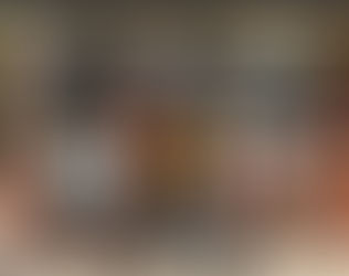 lKes artistes Hélène Veilleux et Denis Forcier devant la galerie Studio M