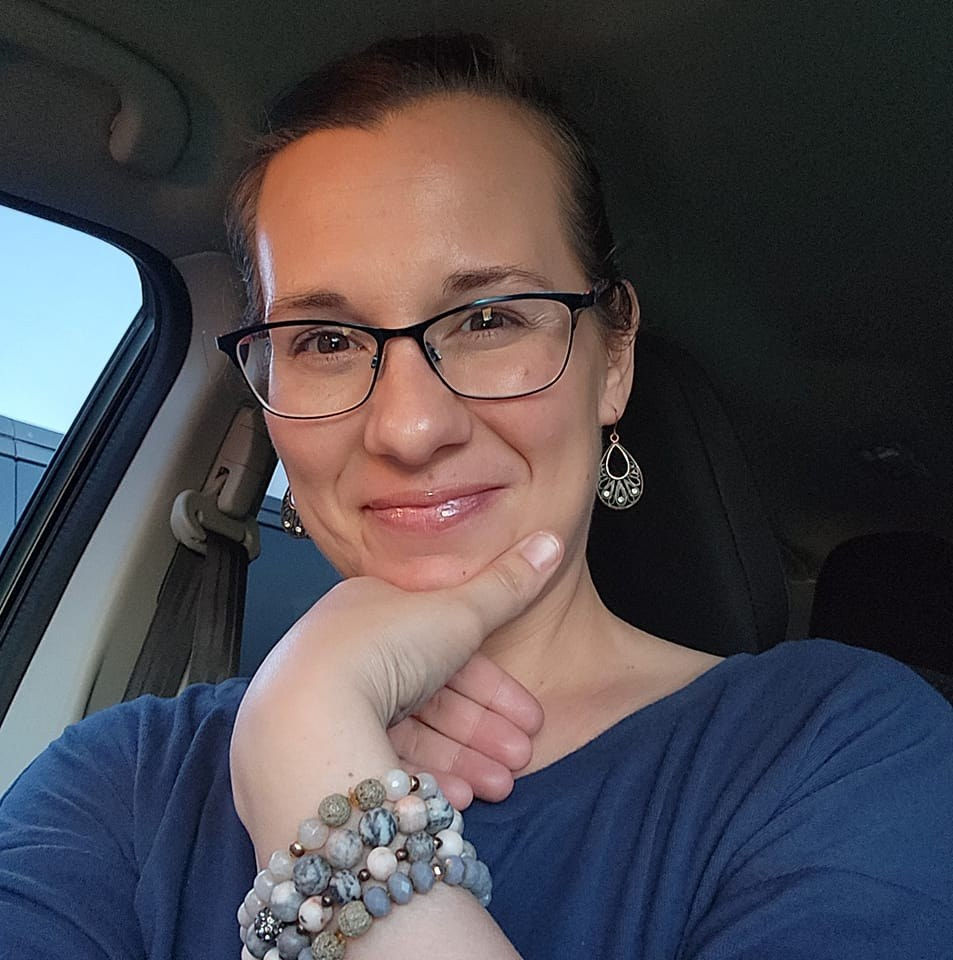 Woman wearing diffuser bracelets for natural living.