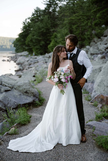bride and groom on tumbled rocks trail devils lake