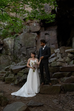 bride and groom at devils lake east bluff trail at sunset