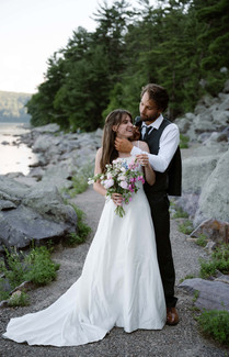 bride and groom on tumbled rocks trail devils lake