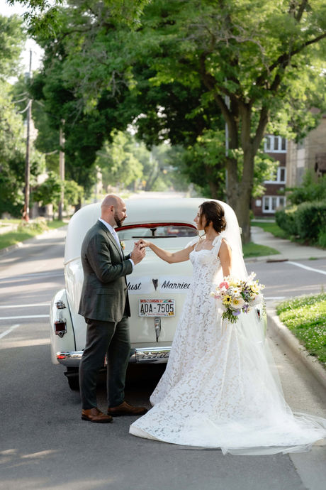 bride and groom with vintage car in madison wisconsin wedding