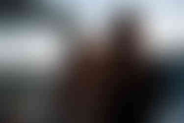 bride and groom with vow books