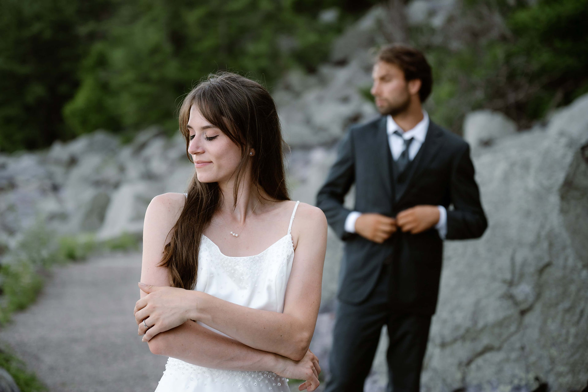 bride and groom on tumbled rocks trail devils lake