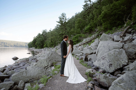 bride and groom on tumbled rocks trail devils lake