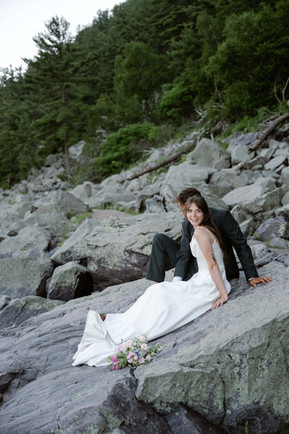 bride and groom on tumbled rocks trail devils lake