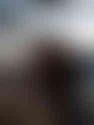 bride and groom with vow books