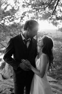 bride and groom at devils lake east bluff trail at sunset