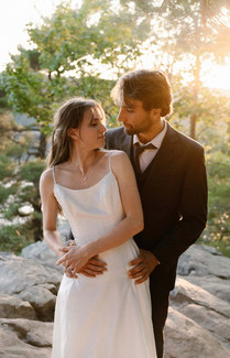 bride and groom at devils lake east bluff trail at sunset