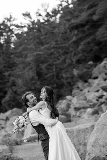 bride and groom on tumbled rocks trail devils lake