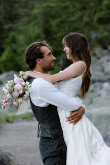 bride and groom on tumbled rocks trail devils lake