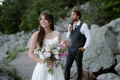 bride and groom on tumbled rocks trail devils lake