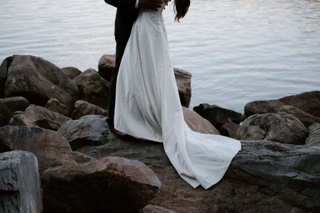 bride and groom on tumbled rocks trail devils lake