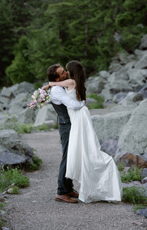 bride and groom on tumbled rocks trail devils lake