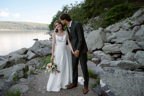 bride and groom on tumbled rocks trail devils lake