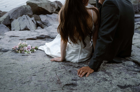 bride and groom on tumbled rocks trail devils lake