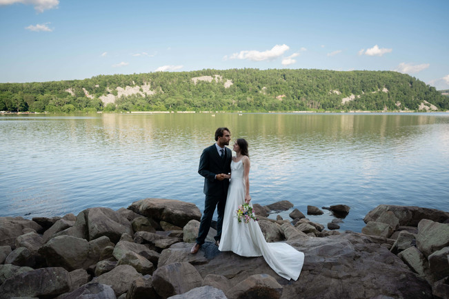 bride and groom on tumbled rocks trail devils lake