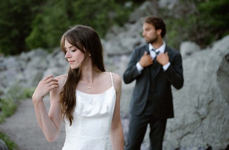bride and groom on tumbled rocks trail devils lake