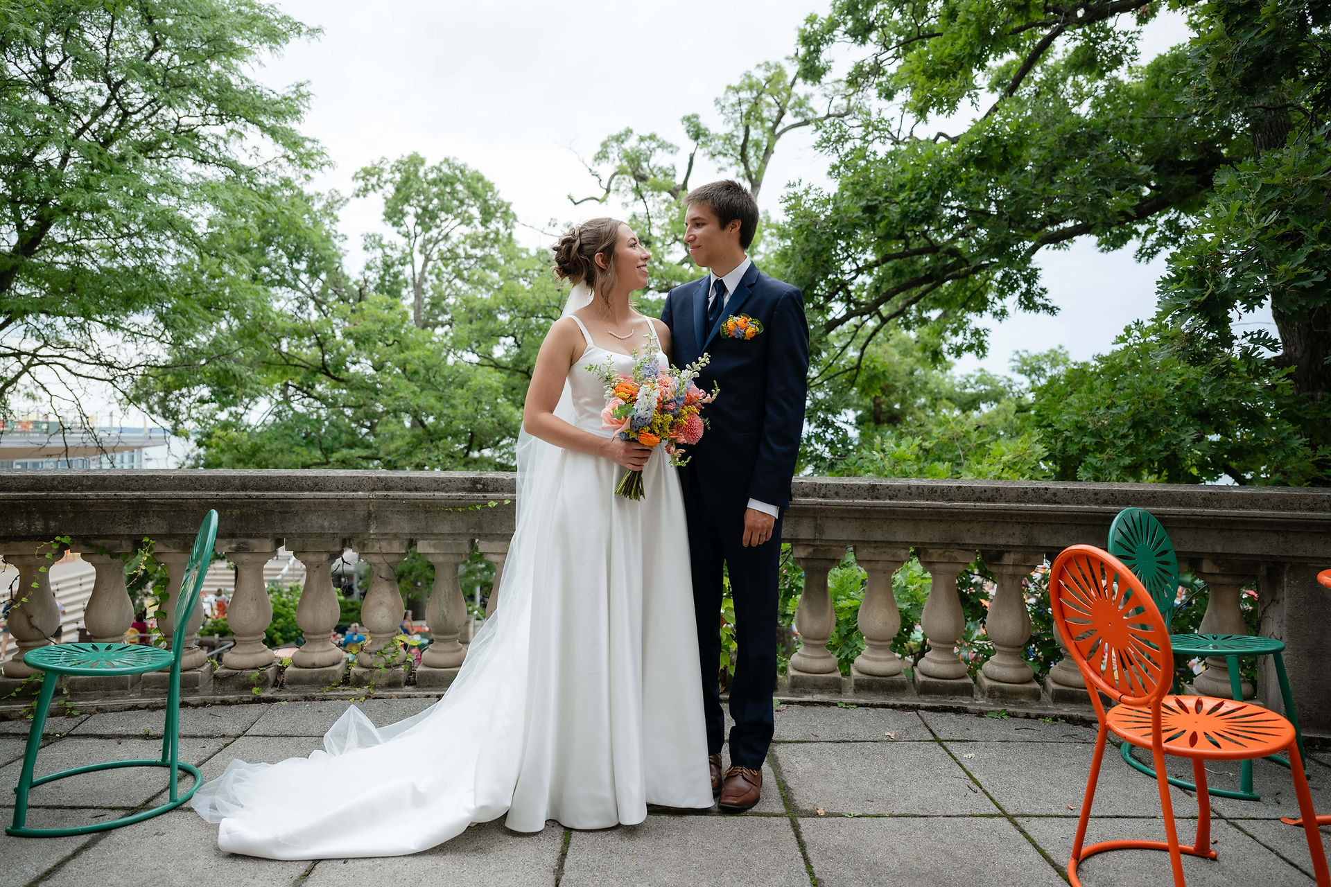 bride and groom on wisconsin union balcony