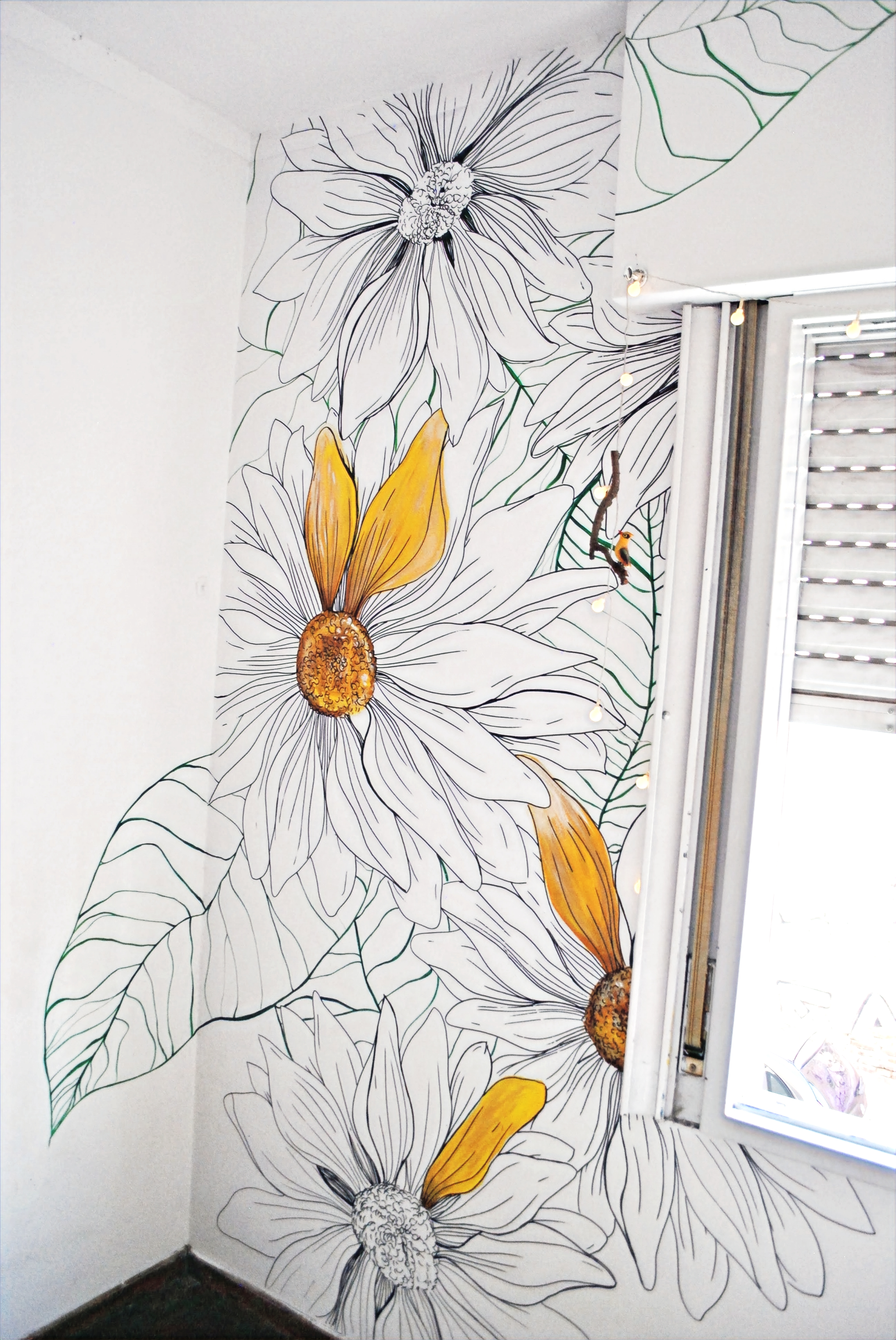 mural girasol en ventana_edited_edited.jpg