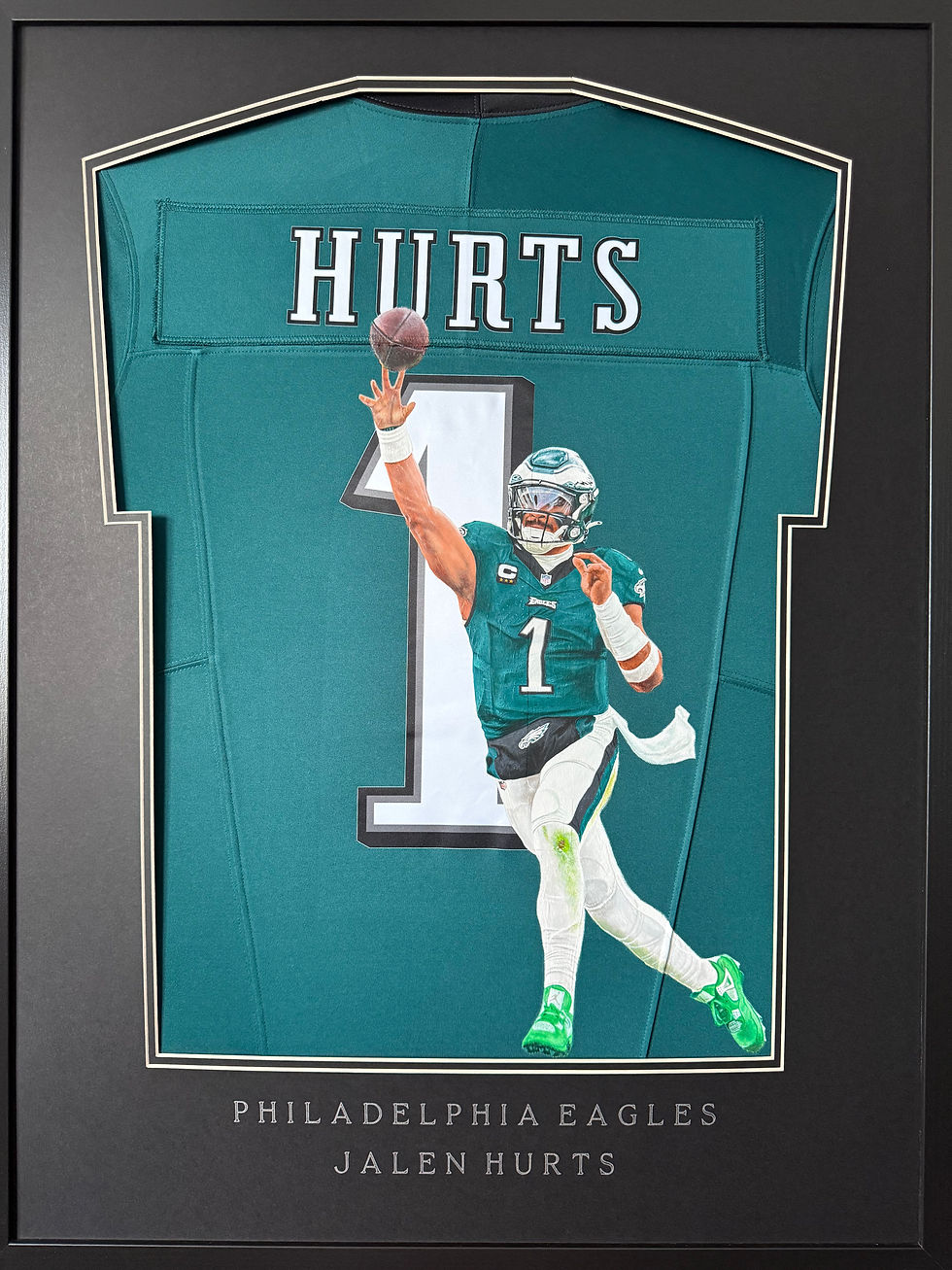 Framed painted jersey of Philadelphia Eagles Quarterback Jalen Hurts hand painted by Sports Jersey Artist Scott Strachan