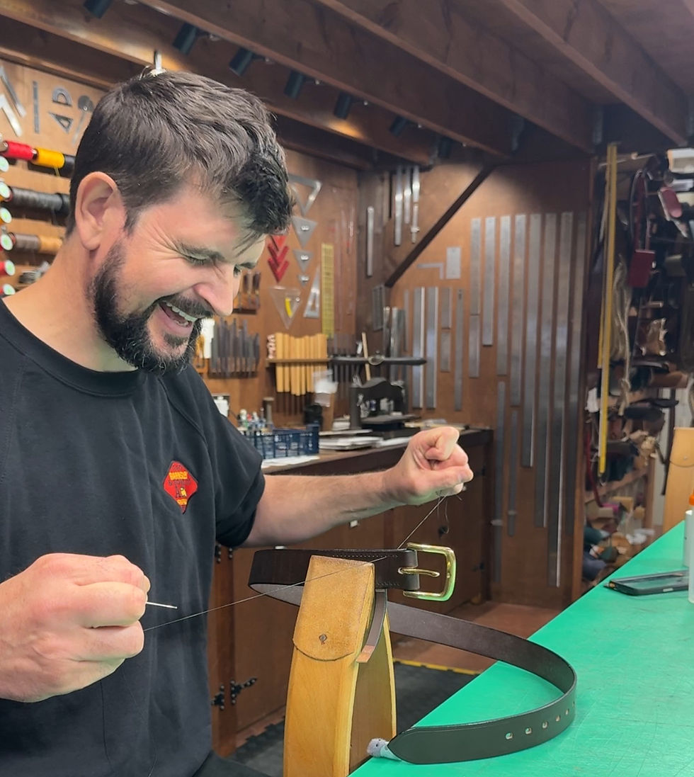 Hand stitching a leather belt
