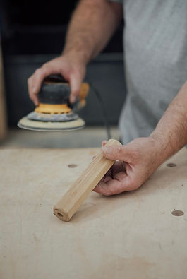 Wood turning wooden tool handle sanding.jpeg