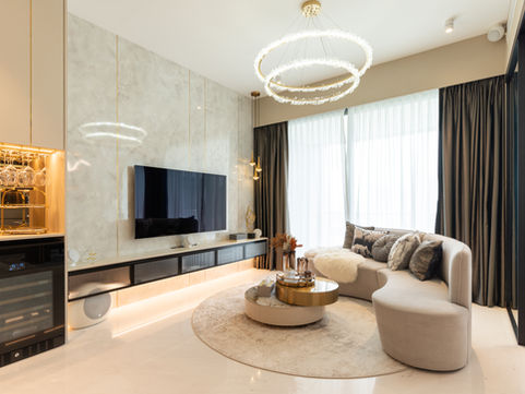 a living room with a couch and a flat screen tv