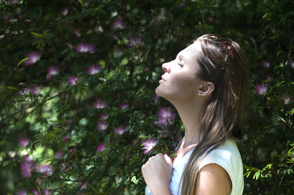 Woman breathing in woods