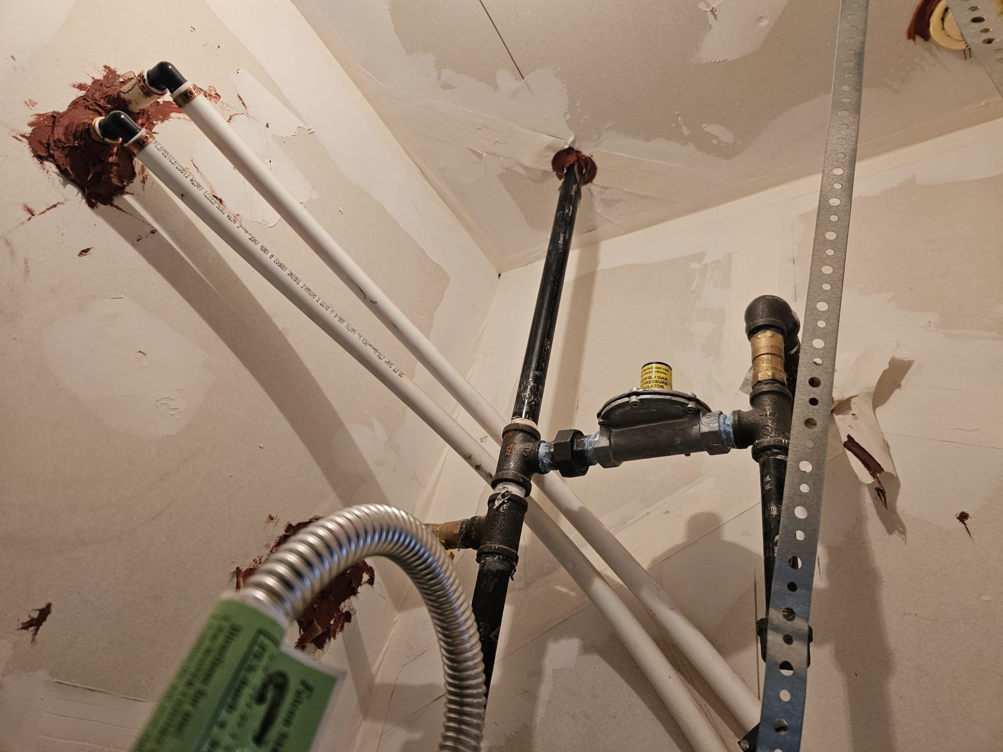 Image depicting a commercial HVAC system's heat exchanger being replaced. Focus on the complexity and scale of the equipment, highlighting the need for professional commercial heating replacement services. Emphasize the potential cost associated with such replacements in commercial HVAC systems.