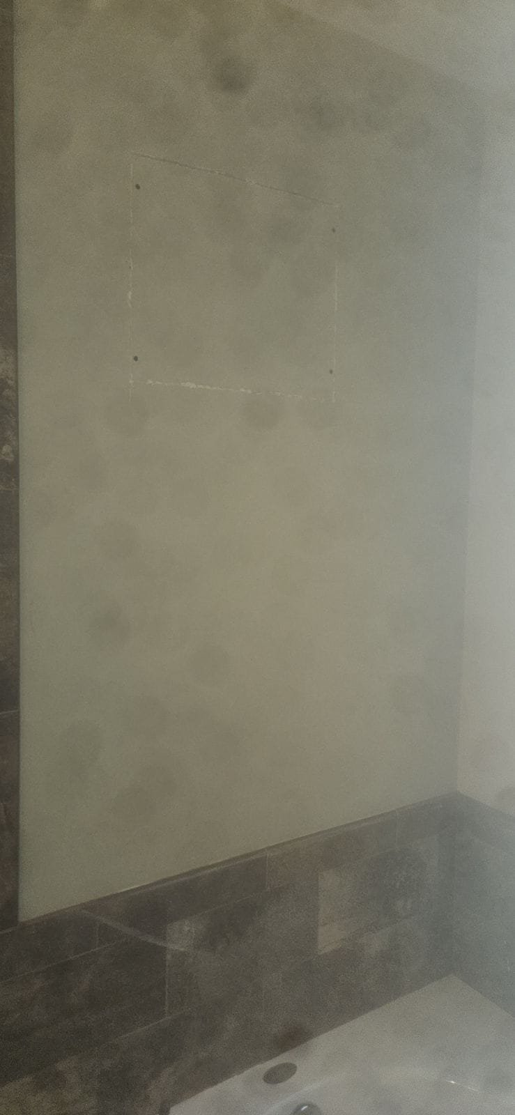 Emergency storm damage repair service truck parked in front of a damaged home, highlighting 24/7 availability and immediate response to disasters. Focus on the truck's bright headlights cutting through the night, symbolizing rapid assistance after a storm.