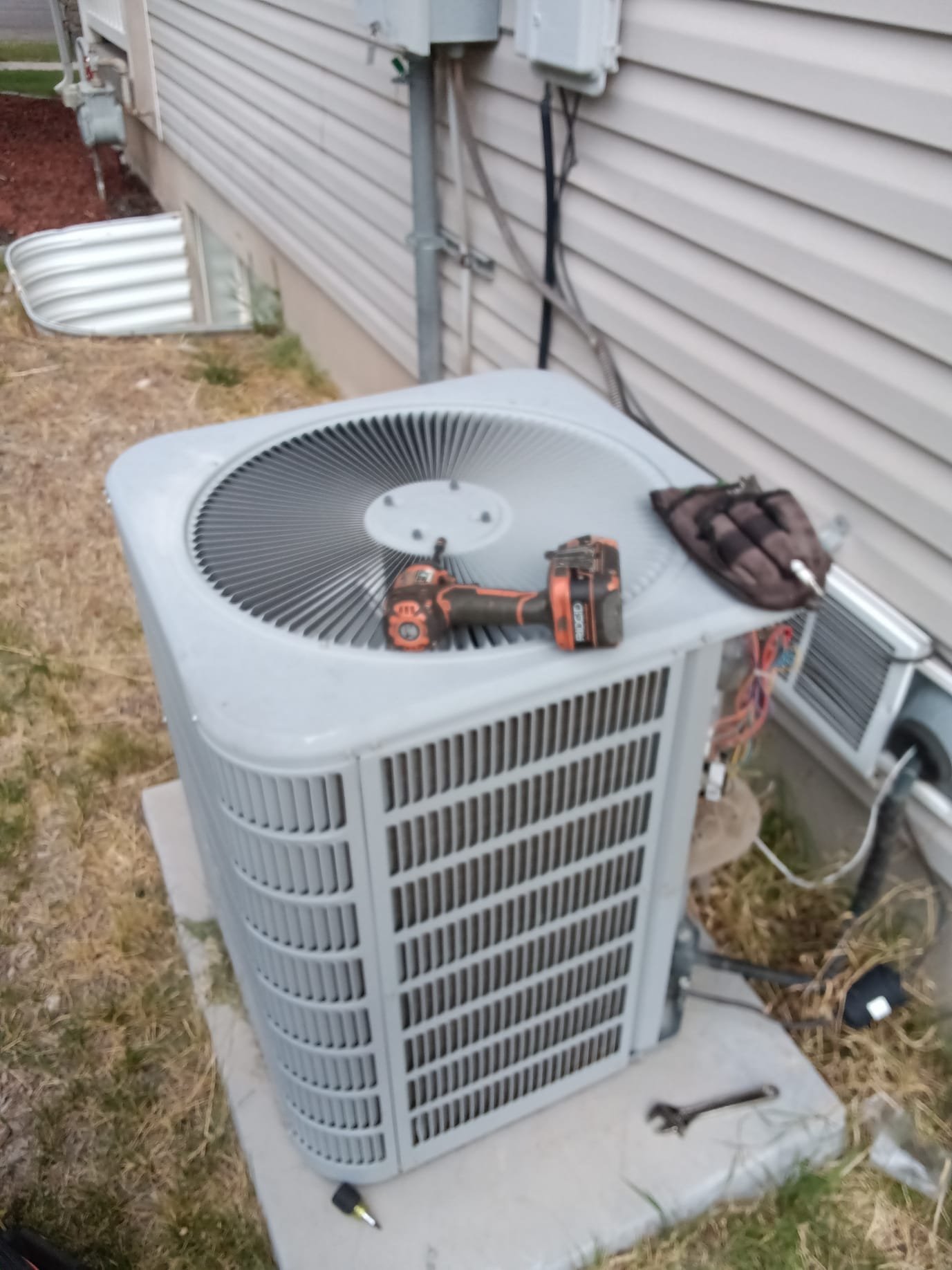 Technician in uniform efficiently repairing a commercial AC unit, showcasing prompt service and expertise, implying quick solutions for 'commercial air conditioning service near me' and immediate 'emergency ac repair'.