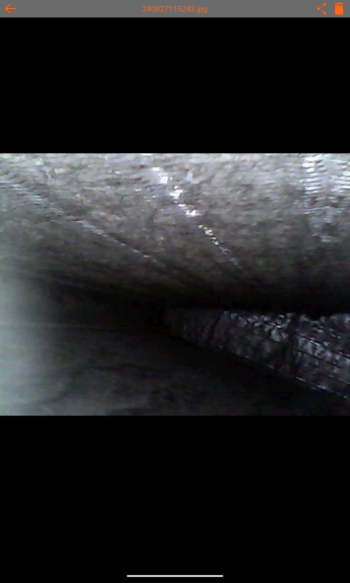 After smoke damage repair, a pristine apartment interior showcases fresh paint, clean surfaces, and open windows, contrasting with the lingering odor implied. The image highlights the value of professional smoke damage repair in restoring a clean, fresh-smelling living space and eliminating costly long-term damage.