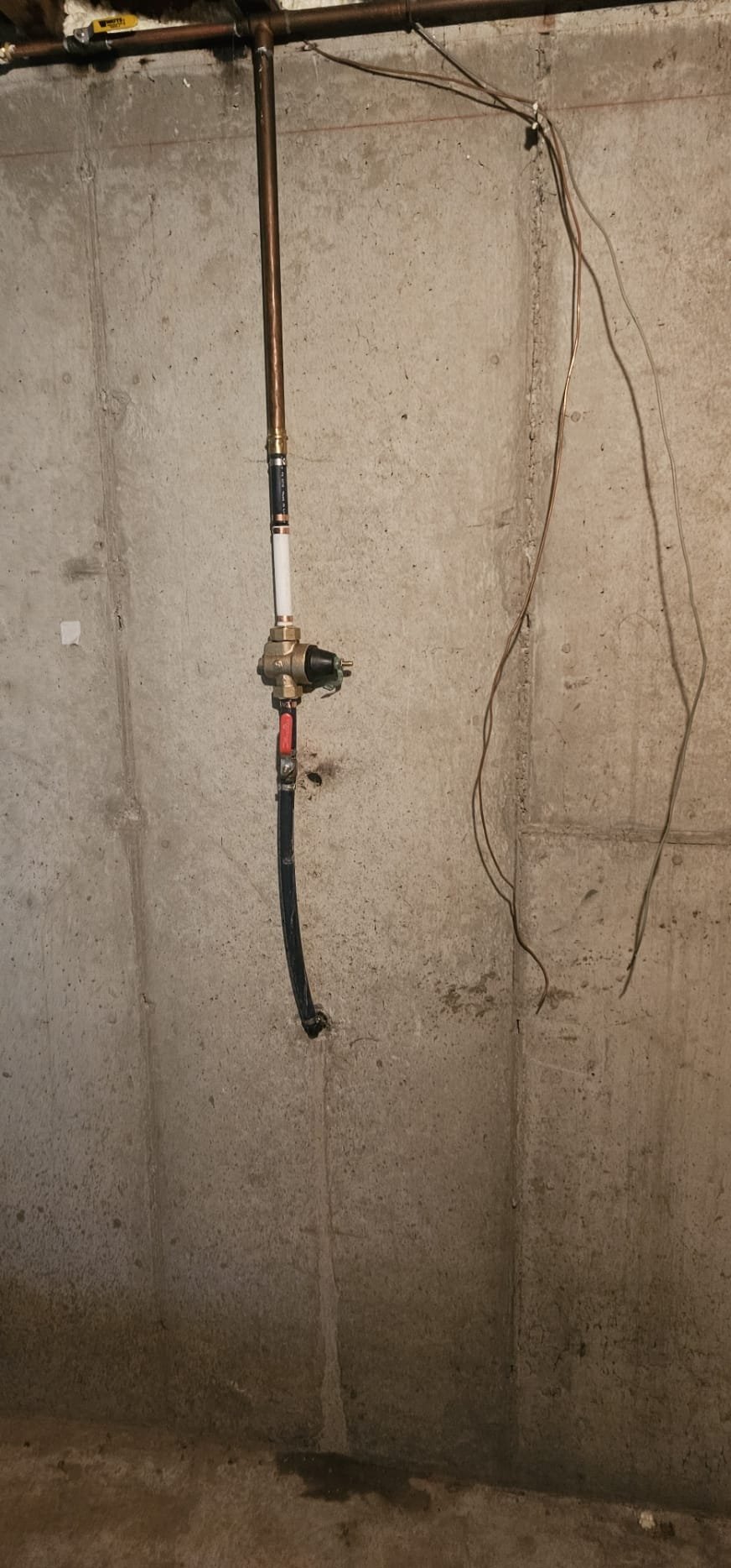 Damaged drywall contrasts with a clean dryer vent hose. Addressing the source, like dryer vent cleaning, prevents costly water damage repairs and keeps your home safe.