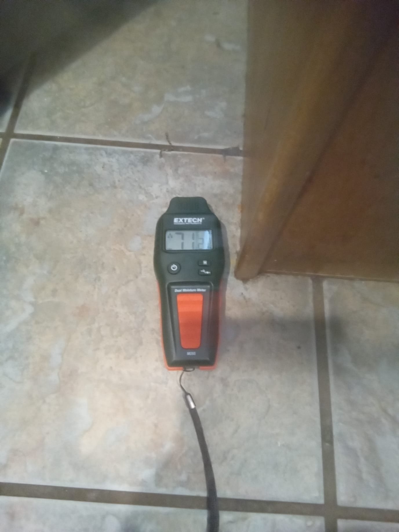 Crystal-clear filtered water pouring into a glass, highlighting the purity achieved with high-quality water filters. In the background, a subtle image suggesting water damage cleanup, emphasizing the filters' role in preventing such issues. Text overlay hints at local water treatment suppliers.