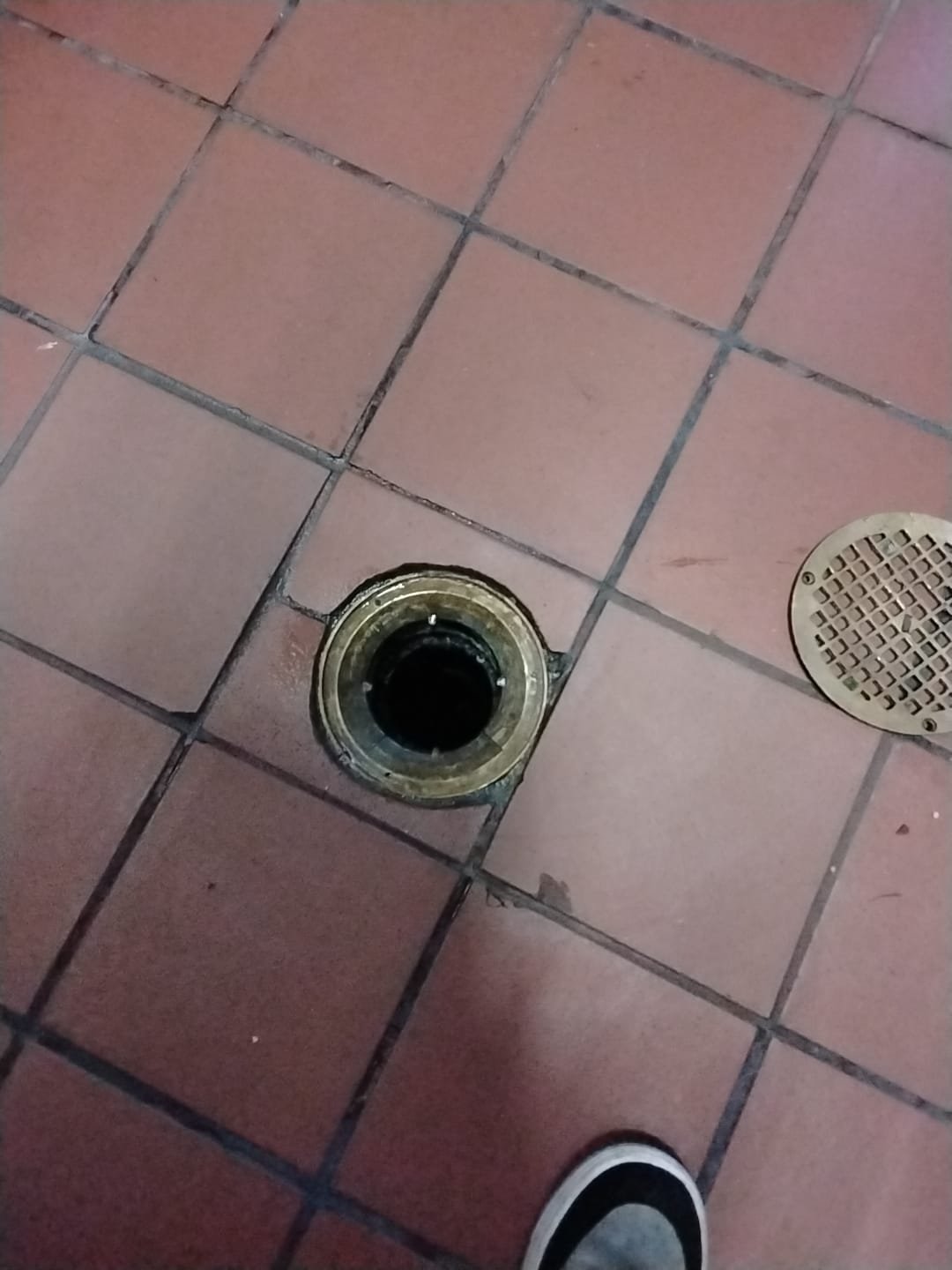 Image of a powerful hydro jetter nozzle blasting away years of accumulated grease and debris from the inside of a sewer pipe, restoring it to full flow capacity. Clean pipes showcase the benefits of hydro jetting, eliminating clogs and backups. Highlights the value of hydro jetting as an effective solution.