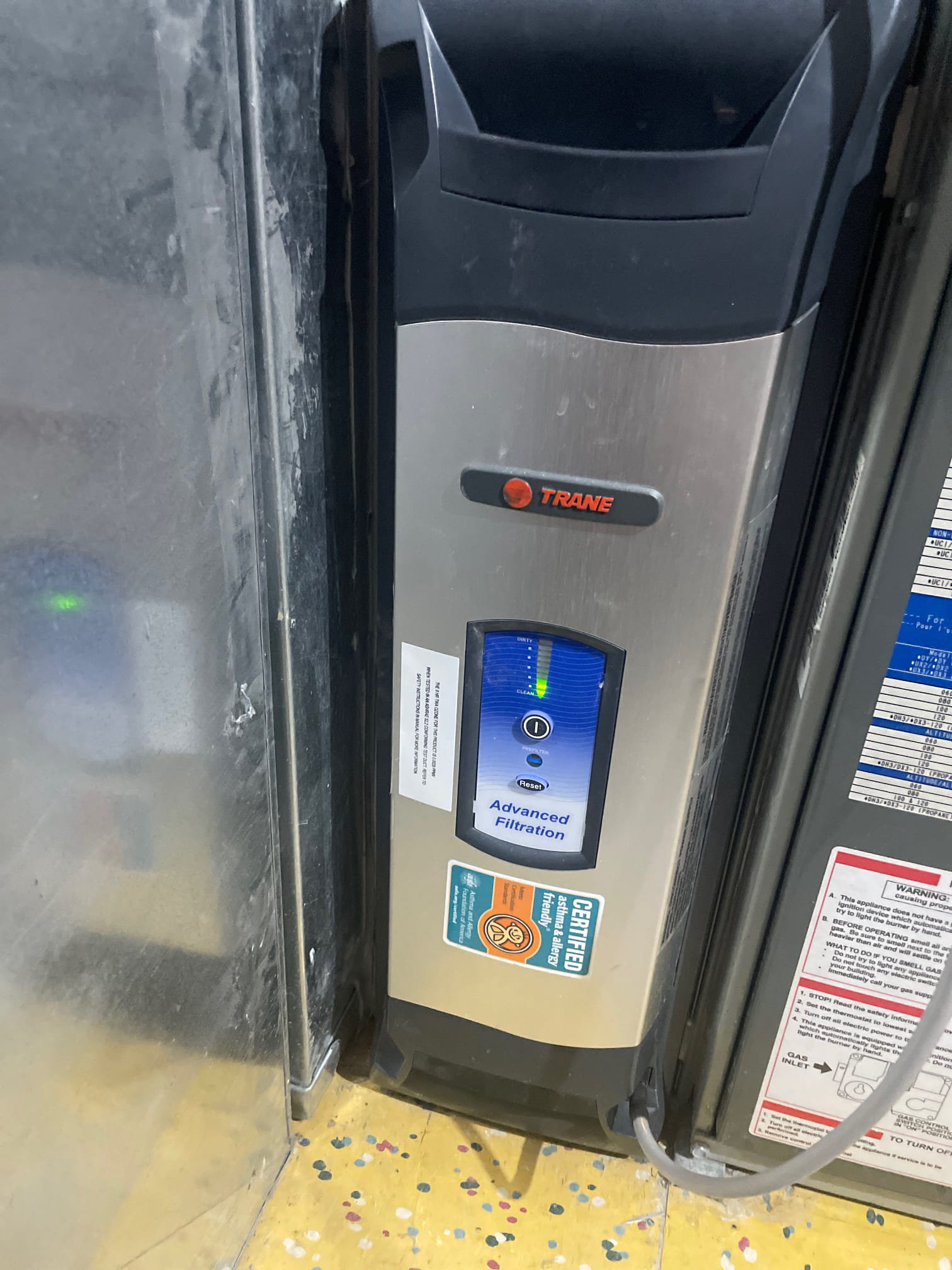 Image of a high-efficiency portable air conditioner and heating unit, representing cost-effective residential heating solutions and the importance of regular tune-ups for optimal performance and energy savings. Get a free heating tune-up estimate today!