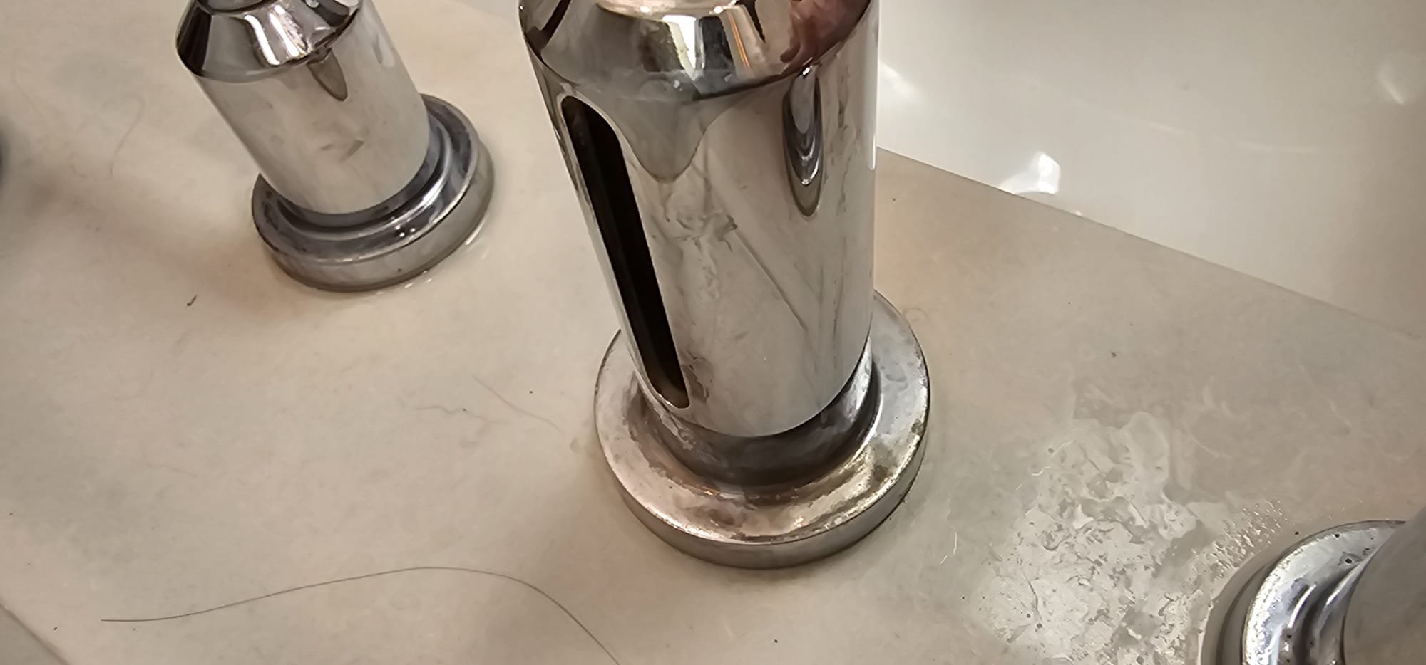 Image of a friendly plumber efficiently fixing a burst pipe with modern tools. Water droplets are minimized, showcasing quick and clean service. A clock graphic subtly indicates 24/7 availability, emphasizing prompt 'local plumbing repair' and '24 hour plumbing repair near me'.