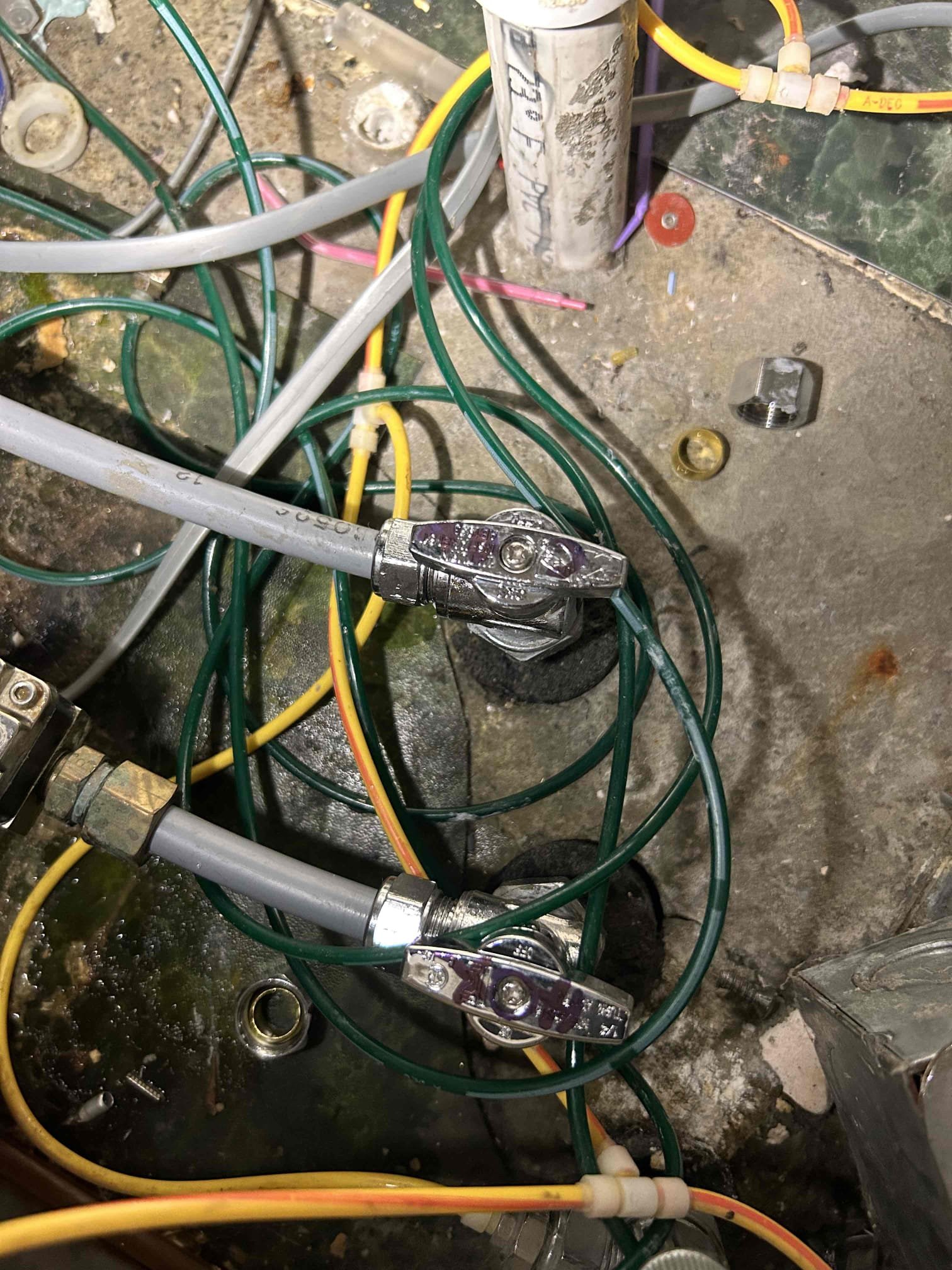 Clean basement with dehumidifier running quietly after mold remediation. Sunlight streams in, highlighting the spotless floor and a prominently displayed flyer about government tax credits for mold recovery services, suggesting financial relief and a healthy home.