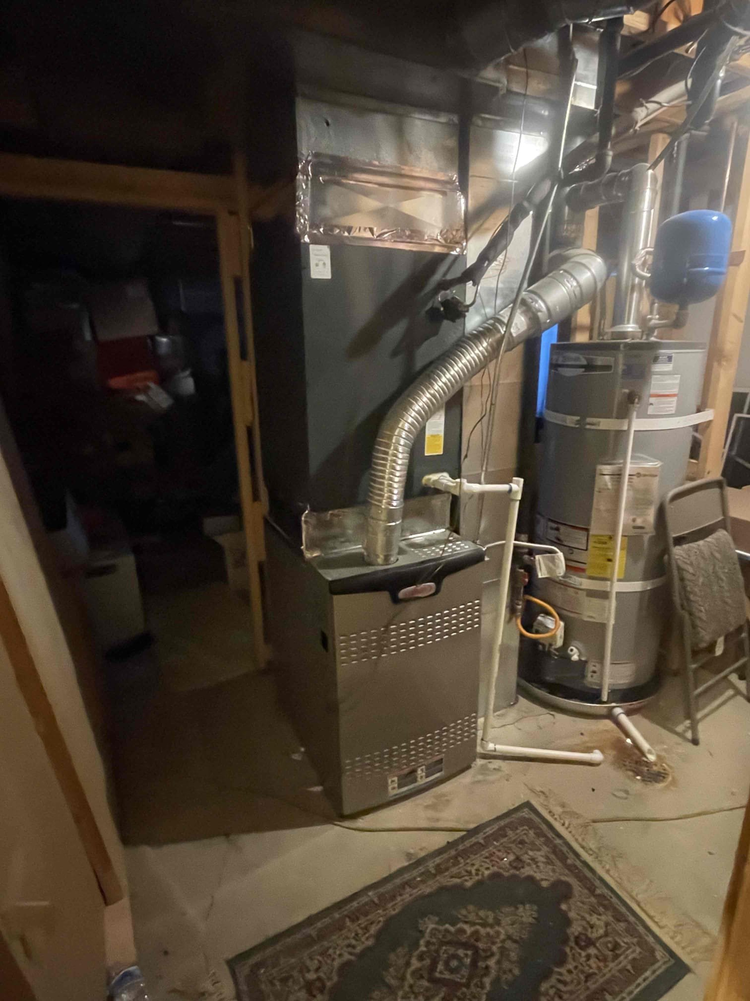 Technician expertly repairs a large commercial HVAC unit; cool air visibly flows, highlighting energy efficiency and reliable climate control for businesses.