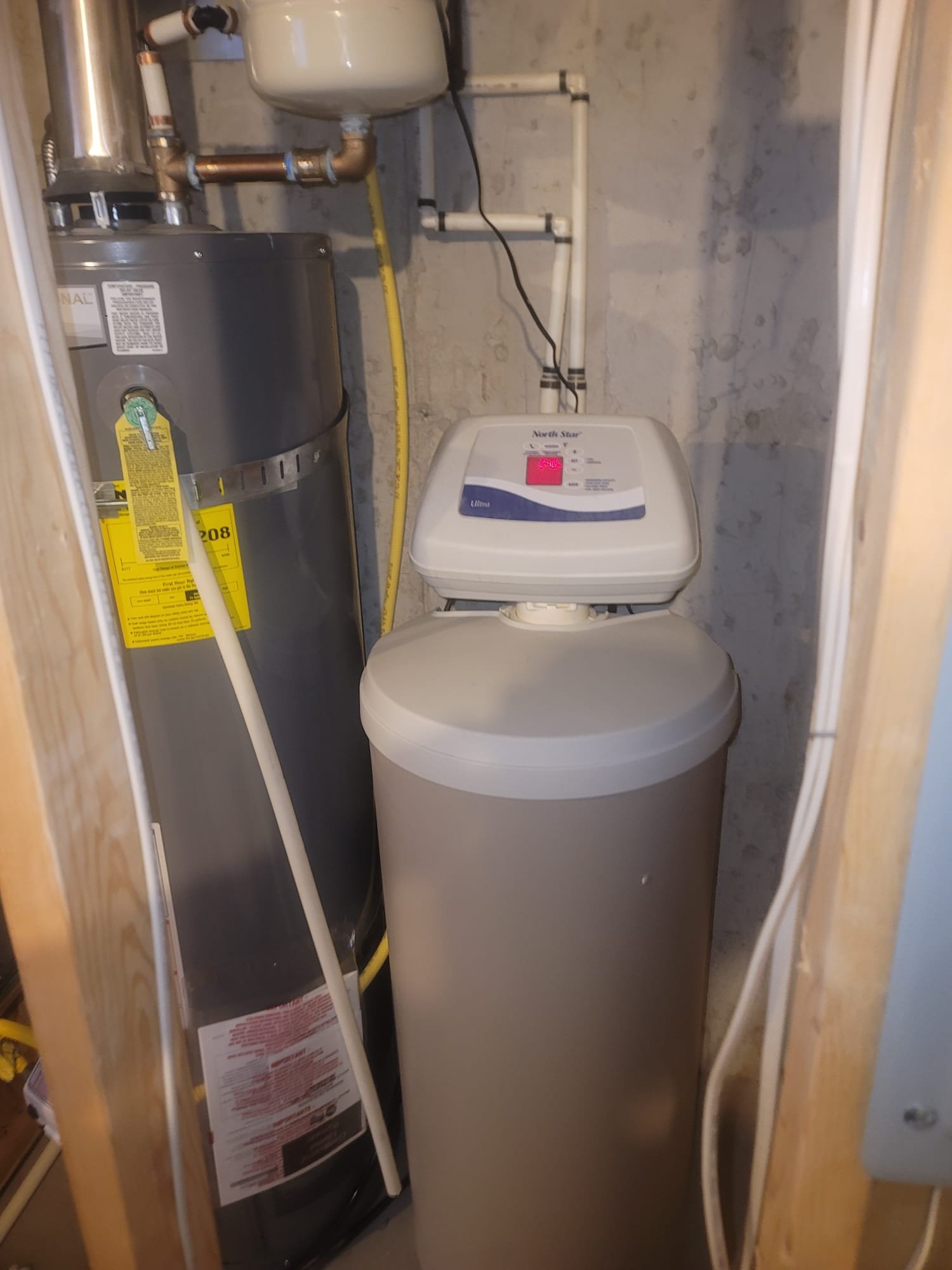 Clean, soot-free pipes gleam after soft water treatment, showcasing energy-efficient home benefits by preventing buildup and ensuring optimal flow.